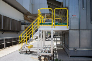 Rolling metal stairs platform for duke energy